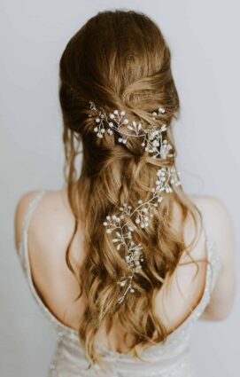 woman wearing white floral hair accessory